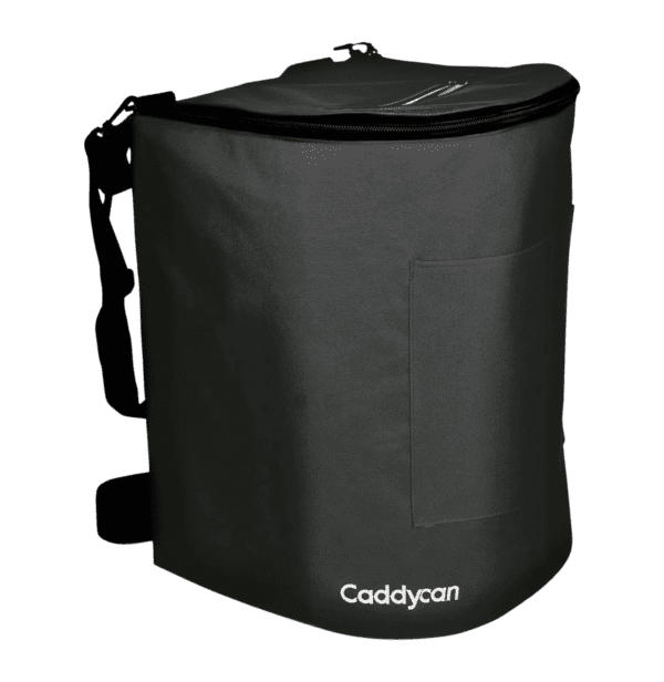A black cooler bag sitting on top of a green background.